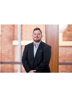 Associate - Logan Hennessy - REMAX Success