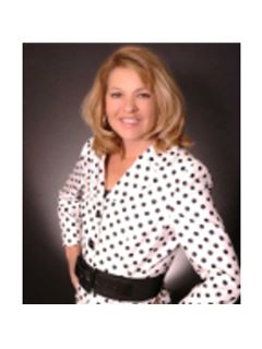 Shelia McCoy - RE/MAX Creative Realty