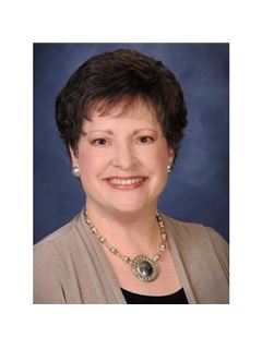 Directeur d'agence - Gale R. Cox - RE/MAX Real Estate Champions