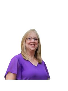 Tomi Tuey - RE/MAX Realty Source