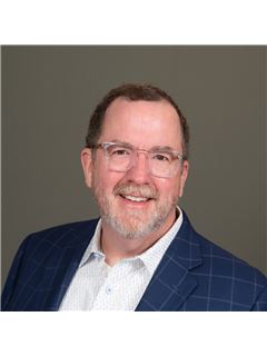 Cleve M. Gaddis - RE/MAX Center