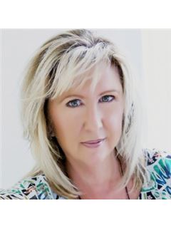 Associate - Holly A. Fogel - RE/MAX Center