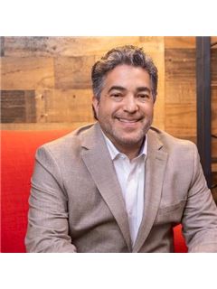 John H. Santiago - RE/MAX Center