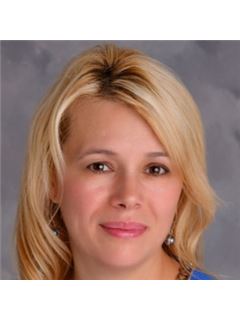 Tanta Ghita - RE/MAX Classic