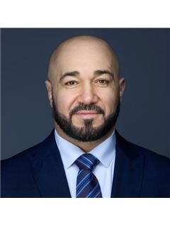 Hussein M Farhat - RE/MAX Team 2000