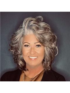 Cheryl A. Weddle - RE/MAX Real Estate Professionals