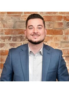 Mitch Isbell - RE/MAX Revolution