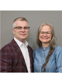 Merrill and Julie Weir - RE/MAX Real Estate Associates