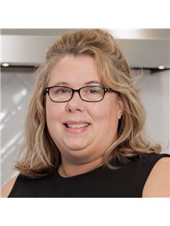 Carrie Abfall - RE/MAX Real Estate Professionals