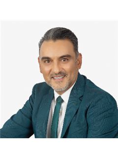 Hector Garza - RE/MAX Elite