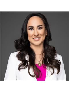 Zita B. De La Garza - RE/MAX Elite