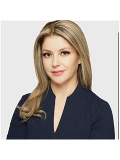 Araceli Carvajal - RE/MAX Elite