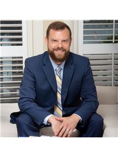 Justin A. Guyer - RE/MAX Professionals