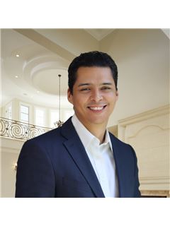 Adrian Arjona - RE/MAX Elite