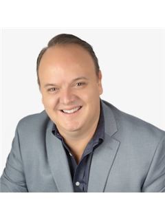 Gustavo Figueroa - RE/MAX Elite
