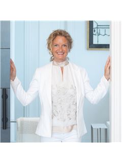 Shelli M. McBrayer - RE/MAX DFW Associates IV