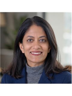 Laxmi Tummala - RE/MAX DFW Associates V