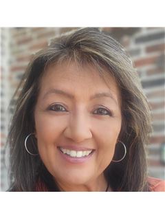 Rosie A. Suarez - RE/MAX Innovations