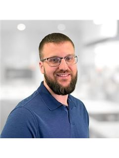Garrett Coss - RE/MAX Preferred Associates