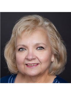 Corrie Robinson - RE/MAX 1st Choice