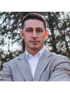 Travis L. Dorman - RE/MAX Elite