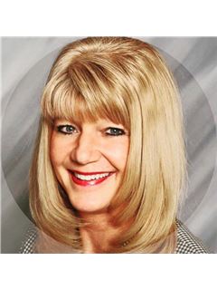 Michelle A. Marini - RE/MAX Elite