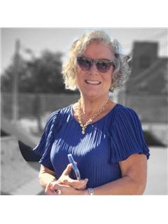 Kim M. Hartzell - RE/MAX Pinnacle