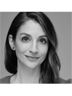 Capri Dessecker - RE/MAX One Realty