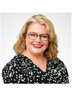 Carrie Brigham - RE/MAX Heritage