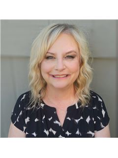 Kristi White - RE/MAX Heritage