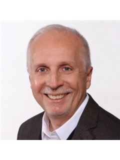 John W Huber - RE/MAX Heritage