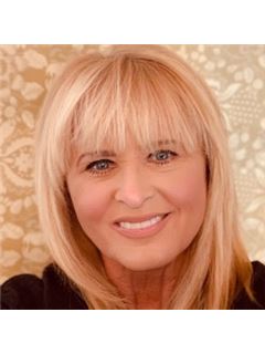 Laura L Row - RE/MAX Premier Realty