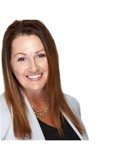 Michele M. Baker - RE/MAX Jefferson City