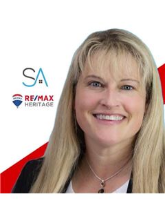 Elizabeth Selaya - RE/MAX Heritage