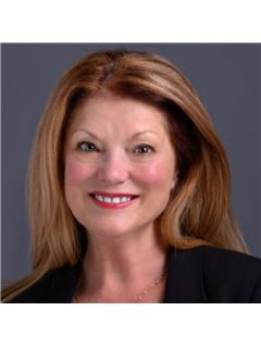 Connie J Carlisle - RE/MAX Paradise