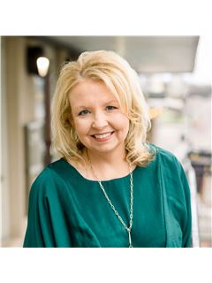 Julie Robertson - RE/MAX Real Estate Partners