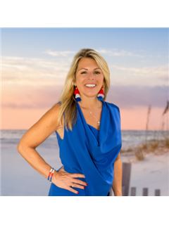 Kristy C. Bushaw - RE/MAX Paradise