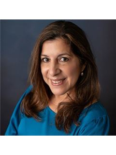 Santi M Adams - RE/MAX N.O. Properties