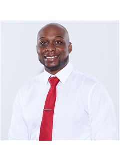 Irving Adams - RE/MAX Tri-State