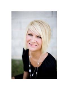 Luci Buschard - RE/MAX Unlimited