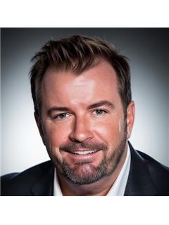 Barry L. Monday - RE/MAX Real Estate Partners