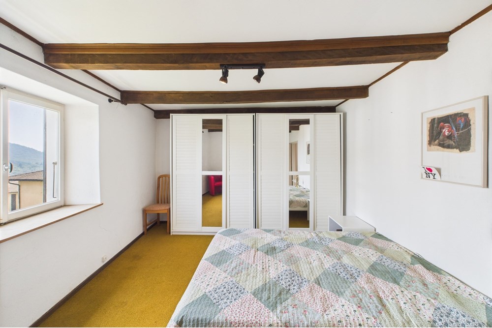 Einfamilienhaus - Kauf - Novaggio, Tessin - 16. Camera da letto_2.jpg - 119001097-14