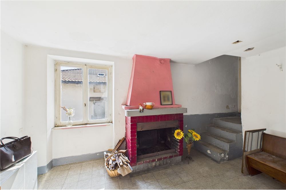 Einfamilienhaus - Kauf - Gandria, Tessin - Soggiorno con camino / Wohnzimmer mit Kamin - 119001086-35