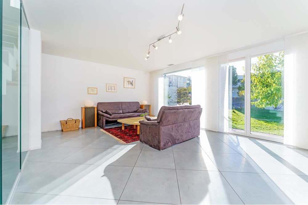 Résidentiel - Maison mitoyenne - Belfaux, Freiburg - CH - Living Room 1.jpg - 119791003-379