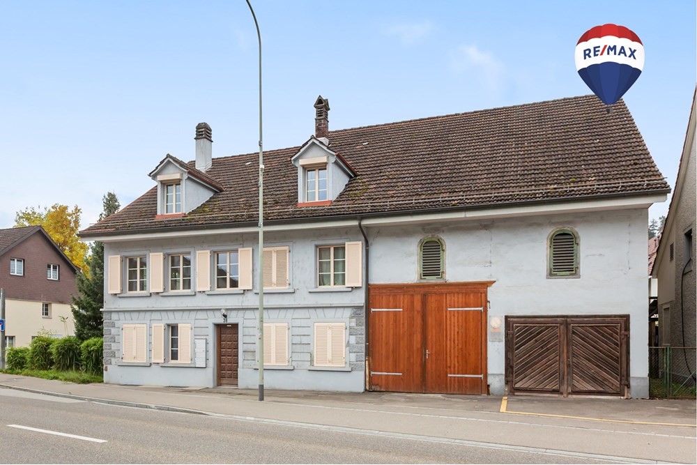 Mehrfamilienhaus - Kauf - Embrach, Zürich - Titelbild Ballon.jpg - 110161022-330