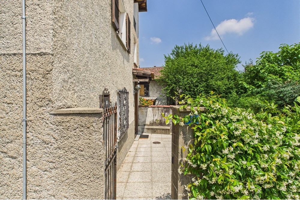 Einfamilienhaus - Kauf - Novaggio, Tessin - 1. Entrata giardino_1.jpg - 119001097-14