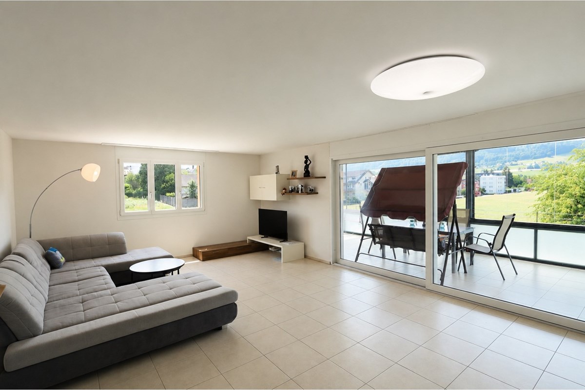 Wohnung - Kauf - Reinach AG, Aargau - Wohnzimmer.jpg - Wohn-/Esszimmer - 111301001-6