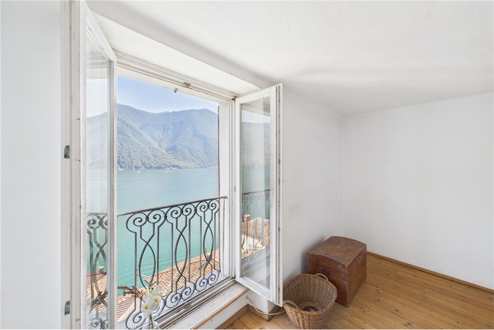 Einfamilienhaus - Kauf - Gandria, Tessin - Camera con portafinestra e vista sul lago/ Zimmer mit Türfenster und herrlichem Ausblick - 119001086-35