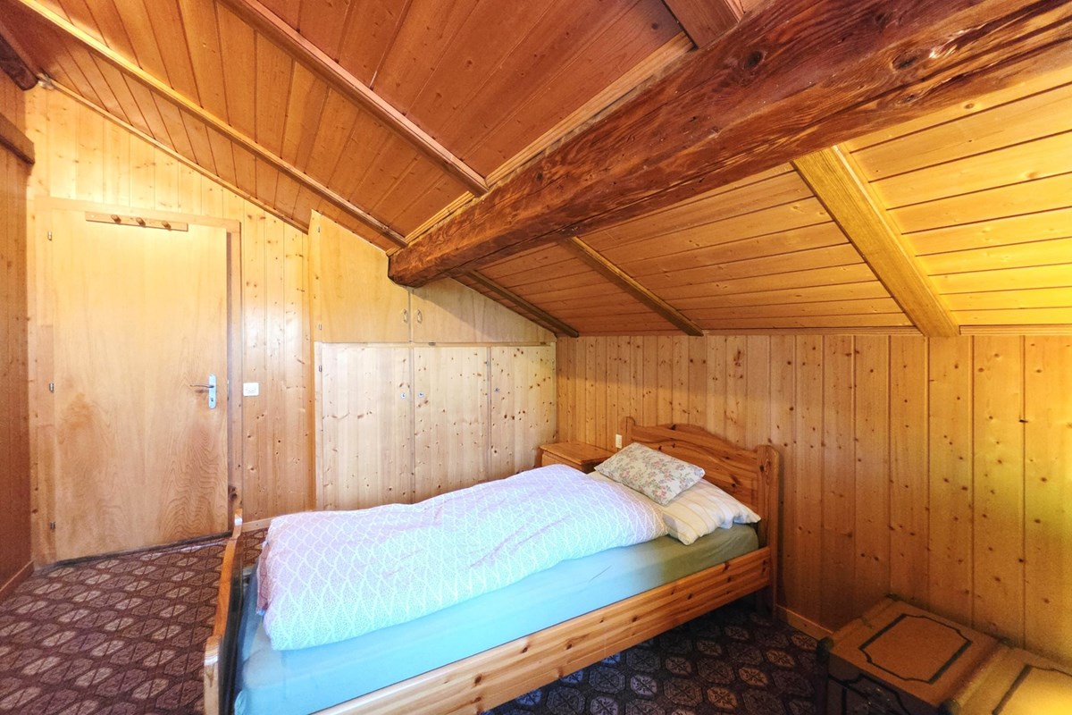 Einfamilienhaus - Kauf - Leuk Stadt, Wallis - EFH Leuk-Stadt_Zimmer 1a.jpg - Schlafzimmer - 119101007-743