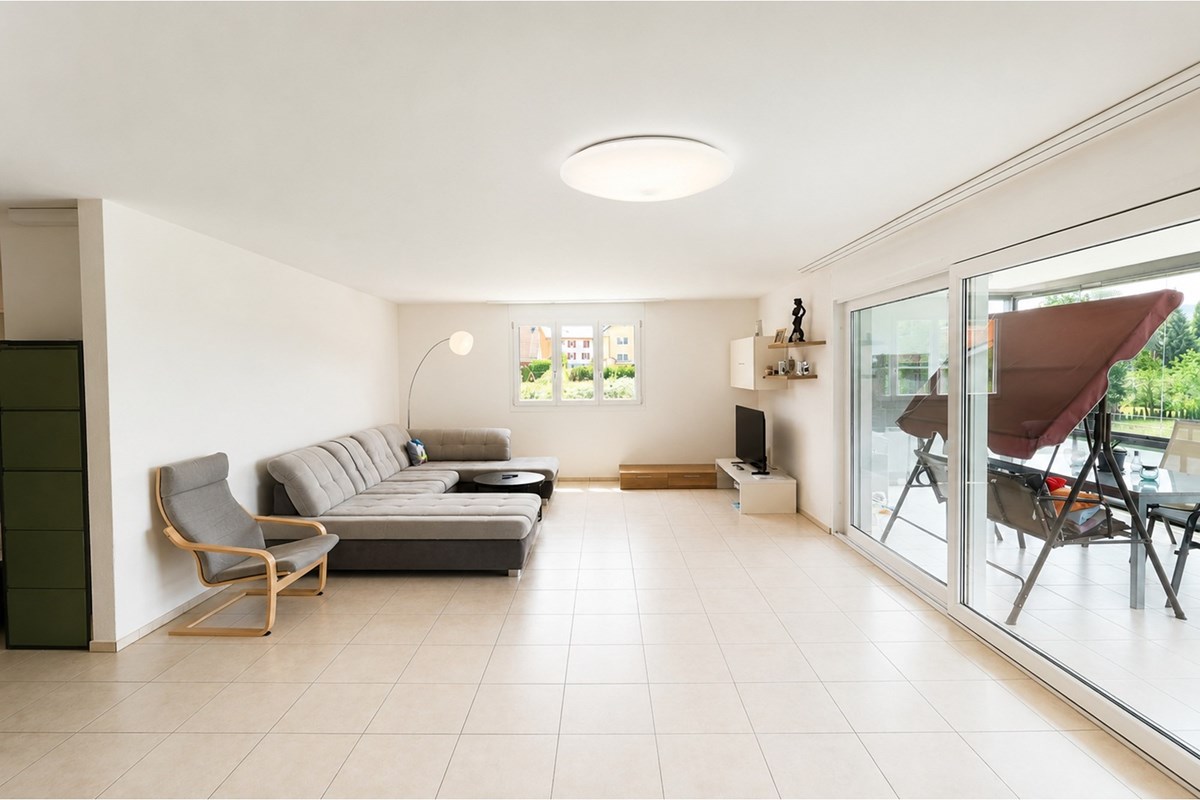 Wohnung - Kauf - Reinach AG, Aargau - Wohnzimmer 2.jpg - Wohn-/Esszimmer - 111301001-6